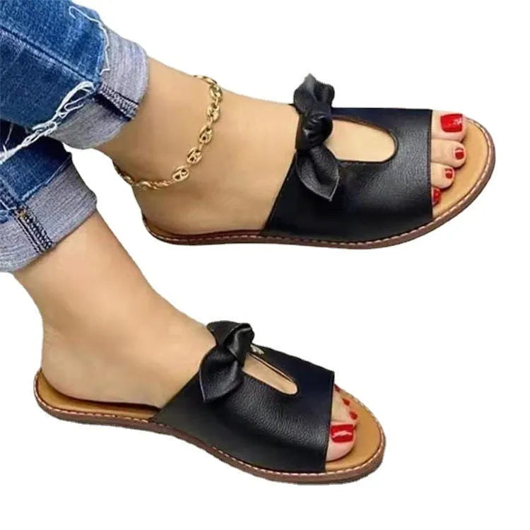 Women's sandals with bow decoration and fish mouth slipper design in black, pink or gold colours