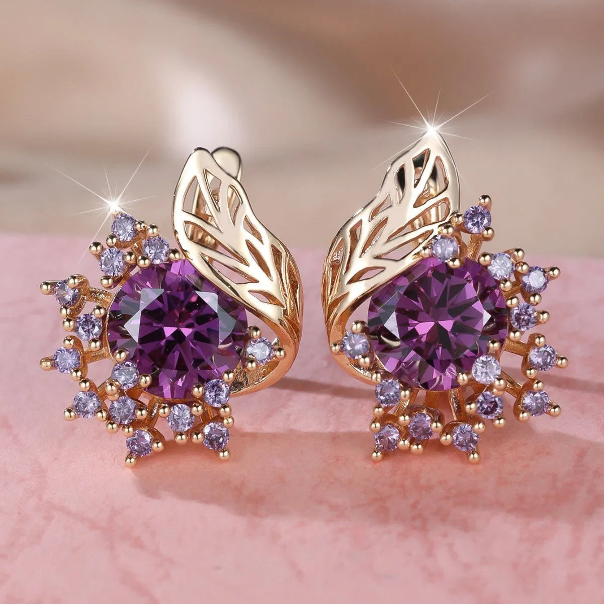 Round flower feather zircon drop earrings with champagne gold electroplate and coloured crystal settings.