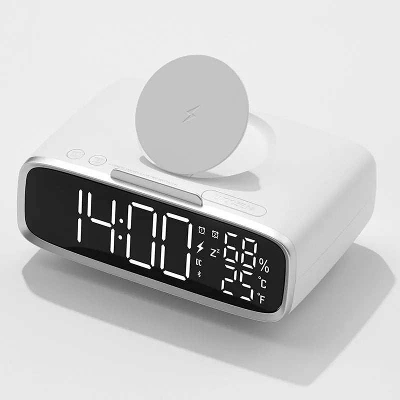 White wireless charging Bluetooth speaker alarm clock with LED night light on bedside table
