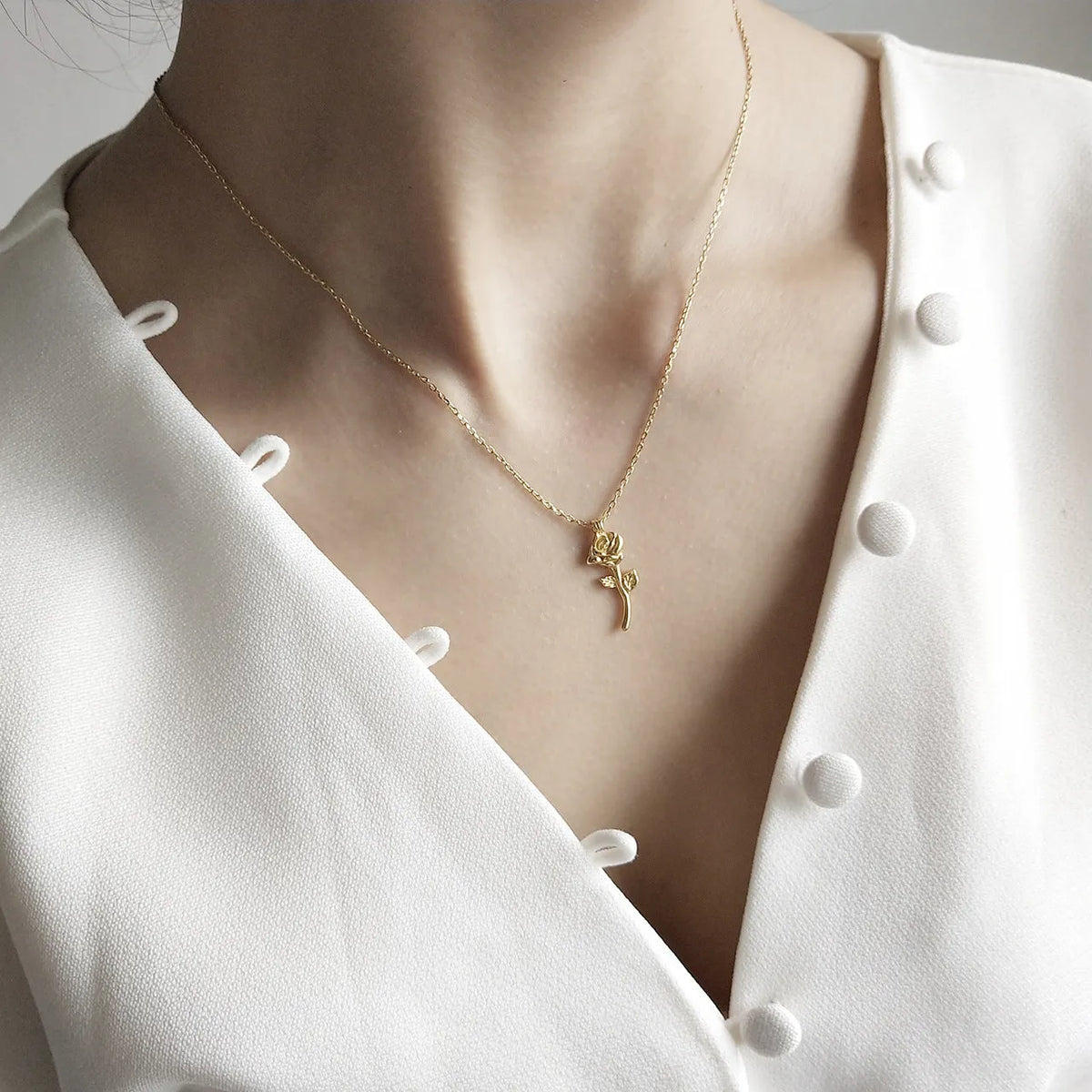 Rose gold necklace with 925 sterling silver gold finish and small rose flower geometric pendant for women