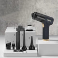 Black wireless handheld car vacuum cleaner with multiple nozzle attachments for interior cleaning