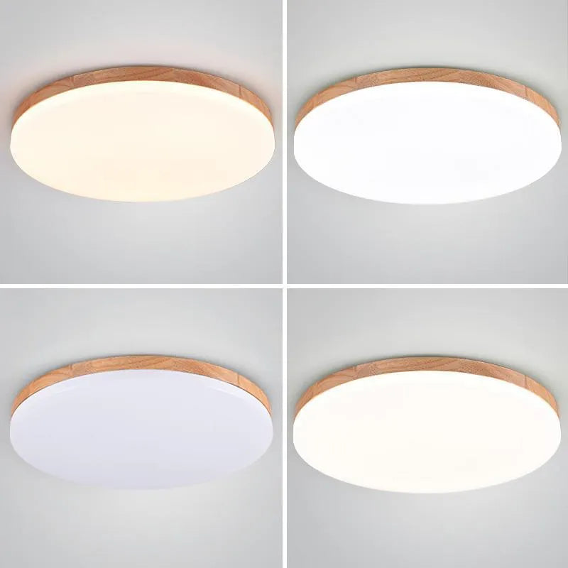 Japanese minimalist ceiling lamp with wood art body and acrylic shade in three sizes.