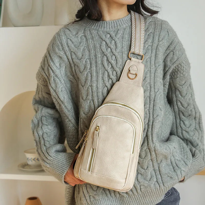 Women's soft PU crossbody messenger bag in street trend style with open pocket and zipper compartments