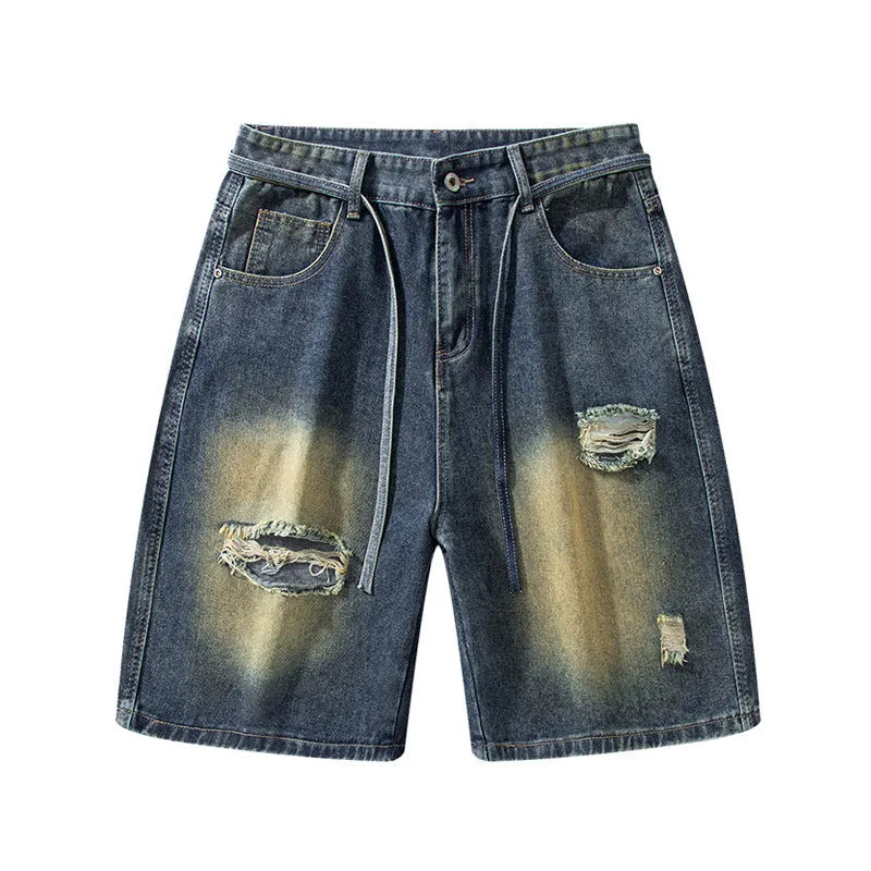 Men's distressed loose fit jeans in retro blue cotton denim with ripped detailing