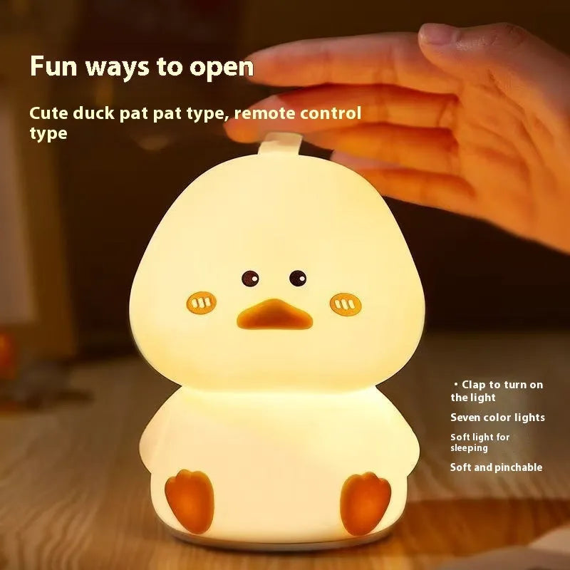 Creative cute happy duck small night lamp with seven colour changing light and USB charging