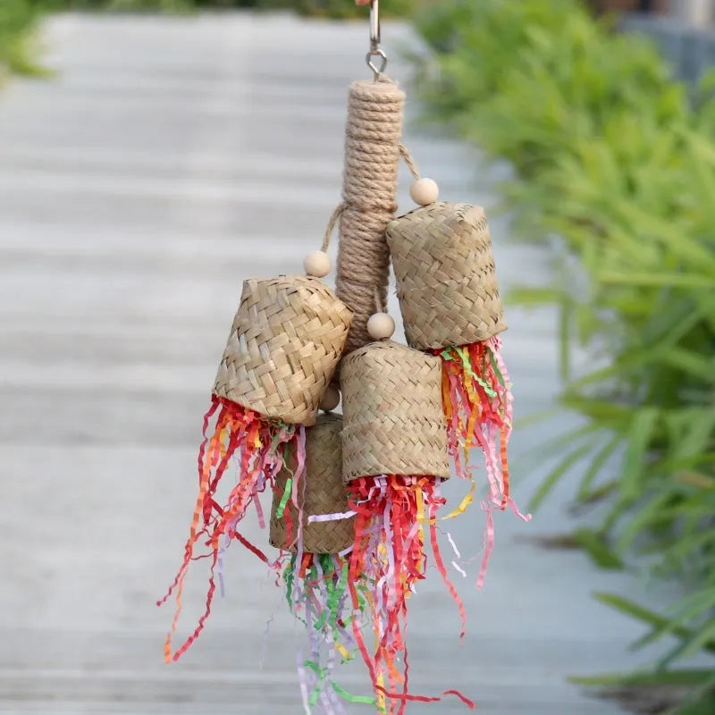 Colourful parrot shredding toy with natural wood and sisal rope measuring 15 by 35 centimetres