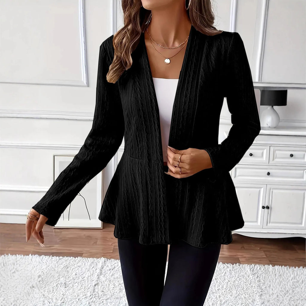 Women's apricot knitted cardigan with Jacquard pattern and one button, shown on a model.