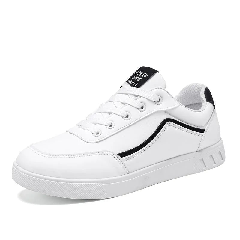 Korean style low top board sneakers in black with white stitching and a flat rubber sole.