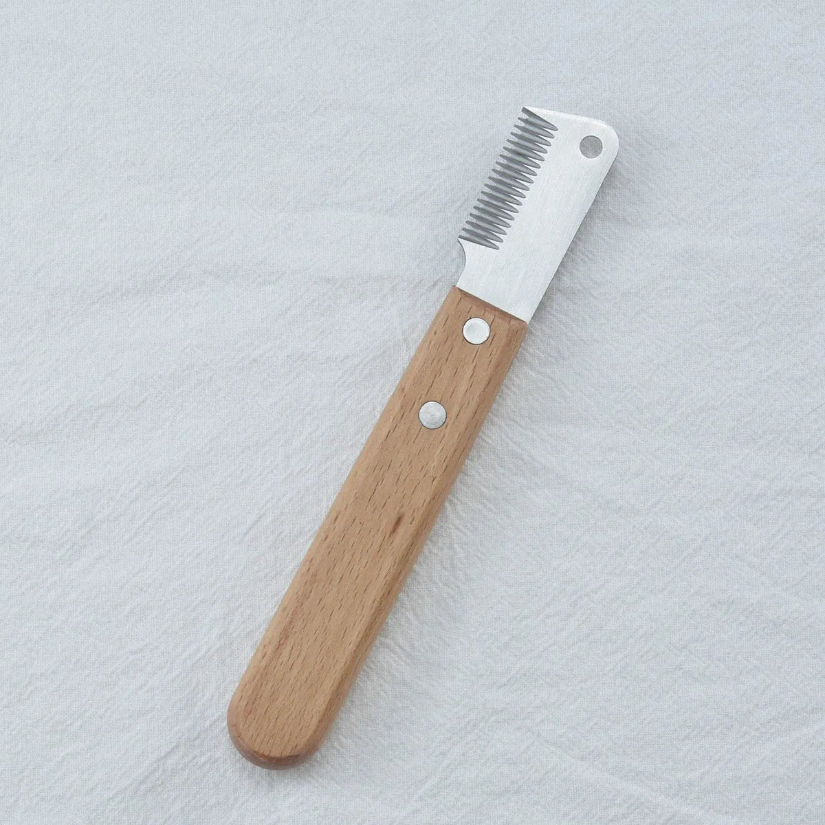 Wooden handle pet stripping comb for grooming dogs and cats, shown in two size options.