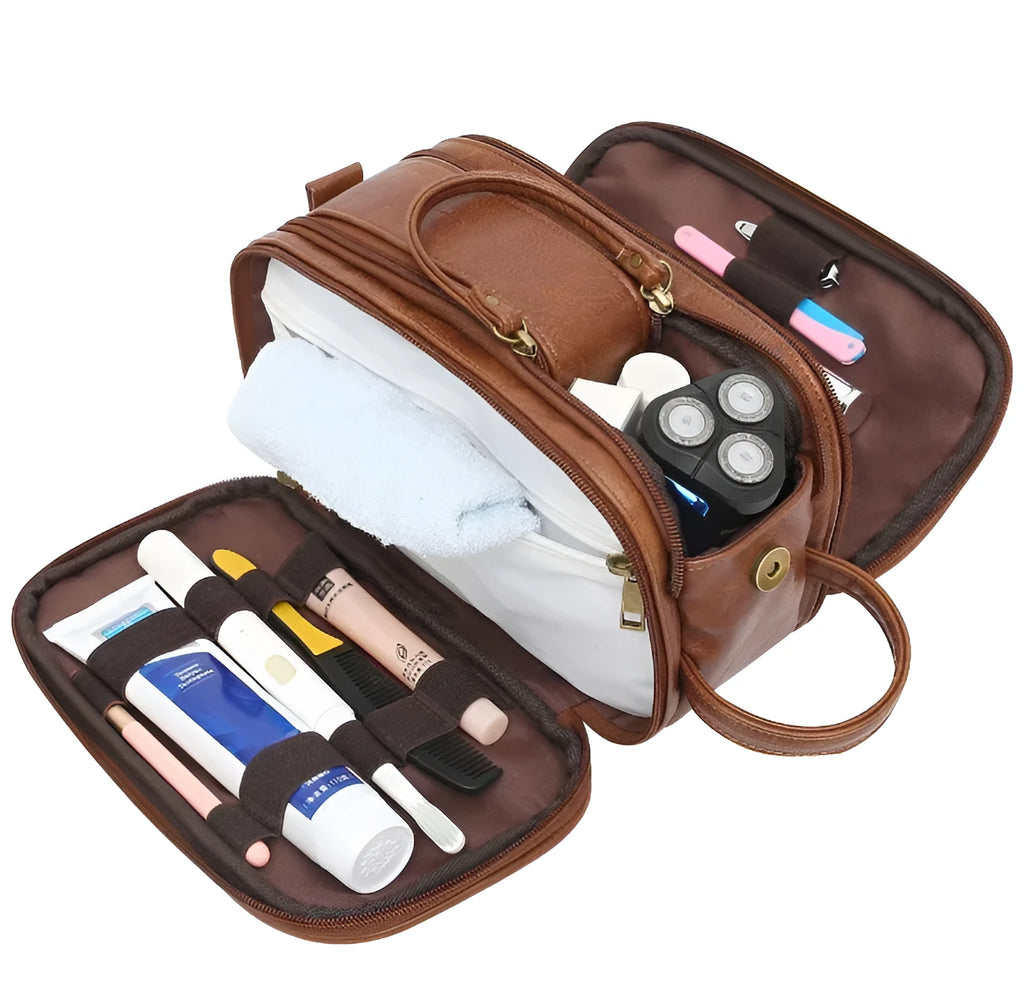 Black and brown men's Pu leather toiletry bag with zipped compartments open.
