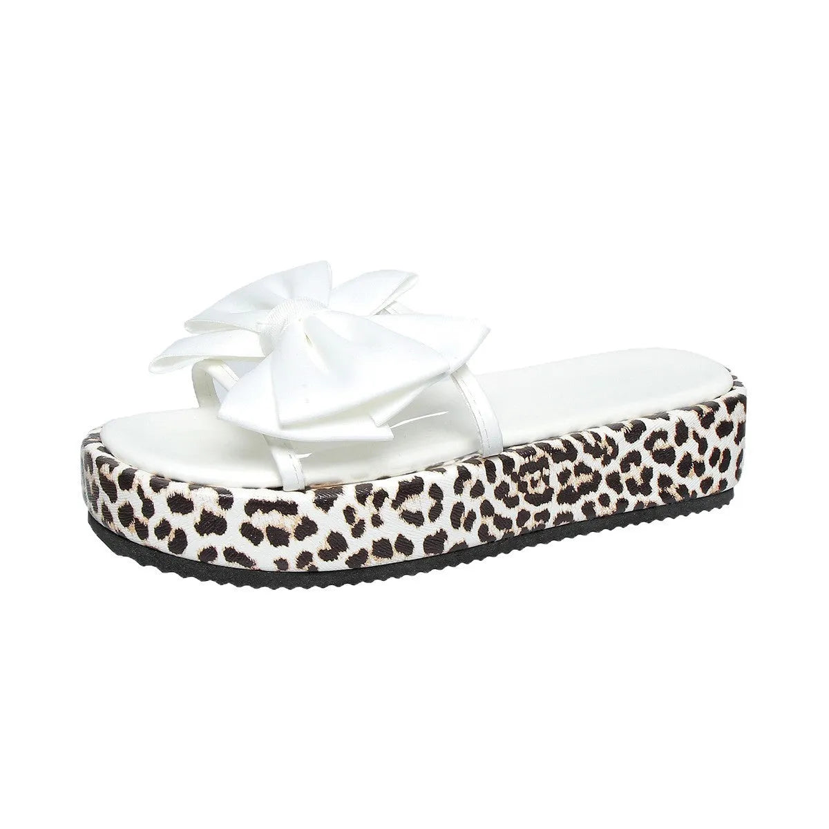 Women's leopard print beach slippers with thick rubber sole and round-toe design in black and white