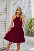 Women's black halter neck strapless chiffon dress with pleated midi skirt