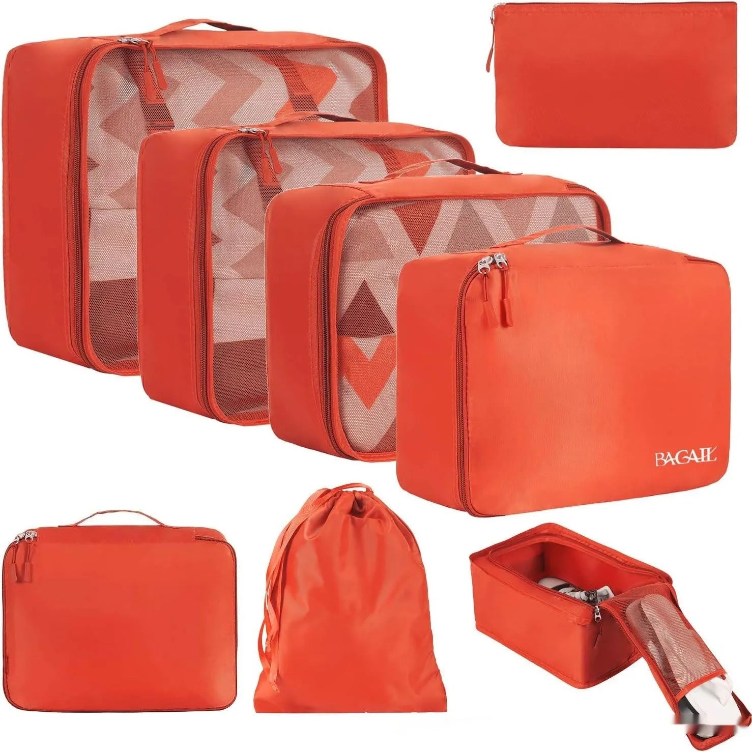Set of eight cubic packing cubes for travel organisation in various colours including beige, black, and pink leopard print.