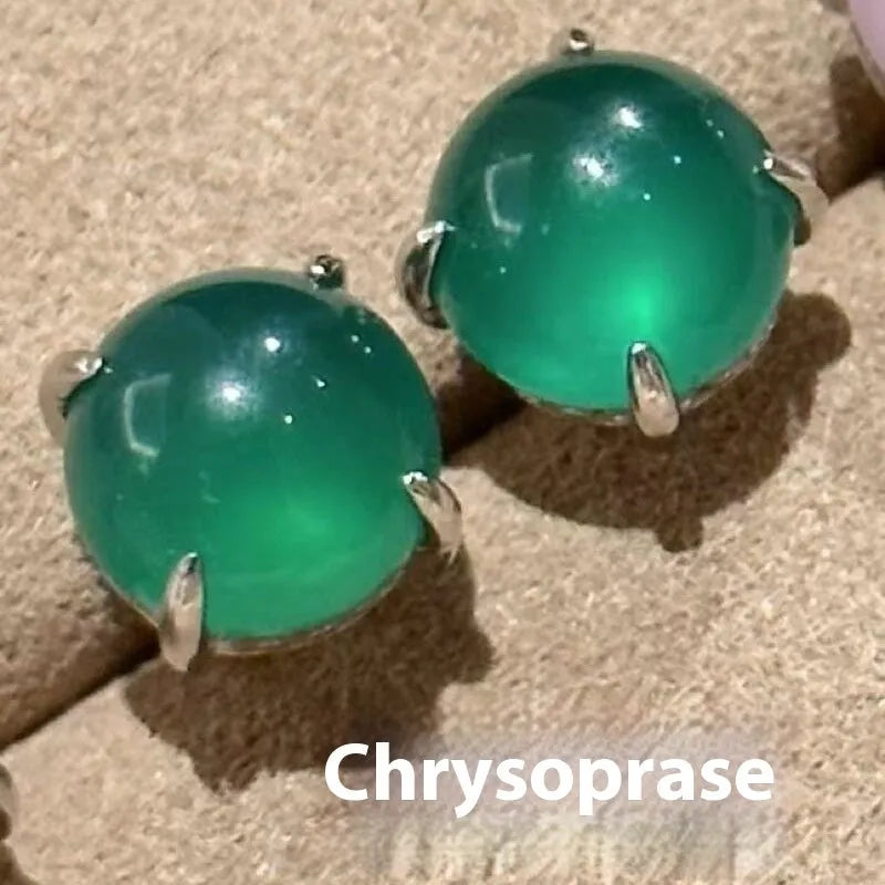 Round egg surface chalcedony stud earrings with four-claw copper setting in retro Chinese style.