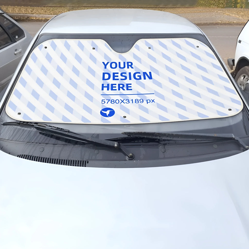 Lightweight car windshield sunshade in black with silver-coated fabric and suction cups