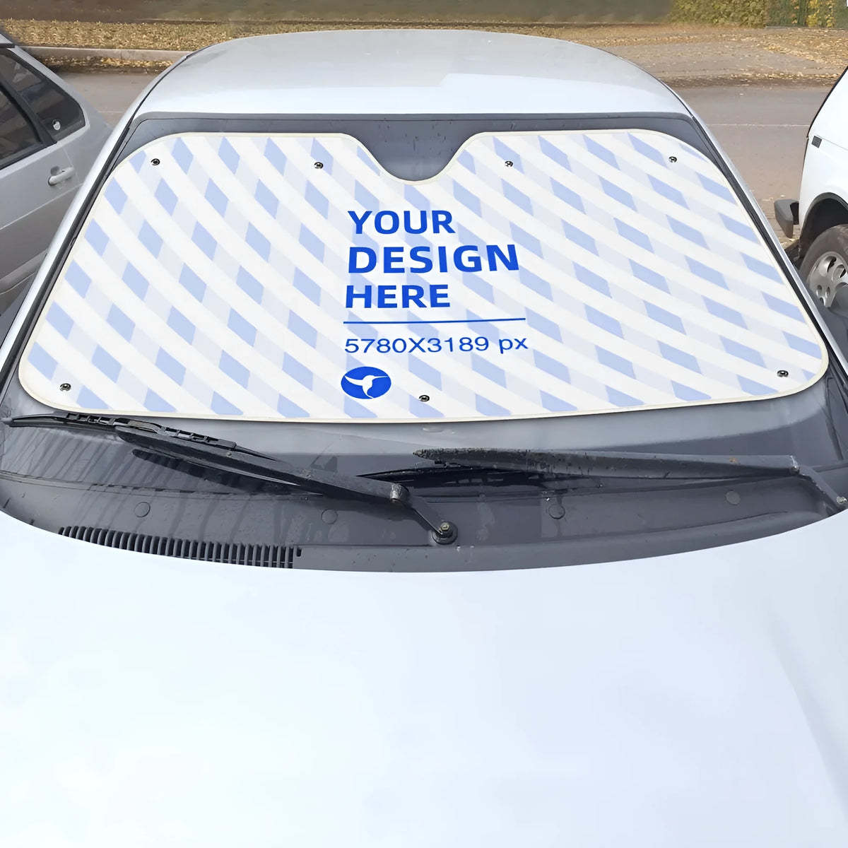 Lightweight car windshield sunshade in black with silver-coated fabric and suction cups