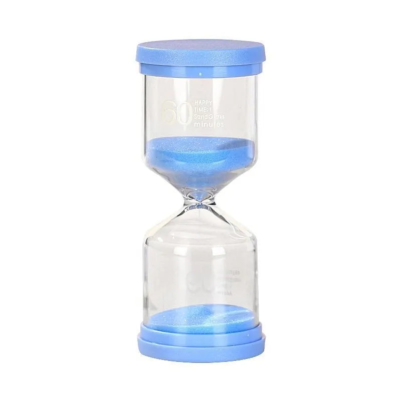 Handmade glass sand timer with blue sand, showing modern simplicity style on a desk.