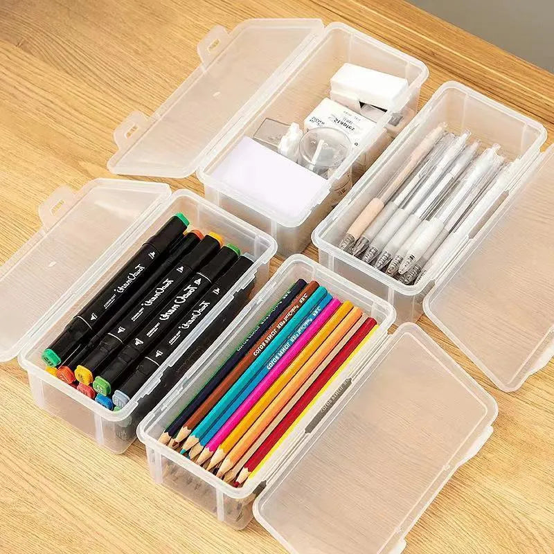 Transparent plastic pencil storage box for organising pens and drawing tools
