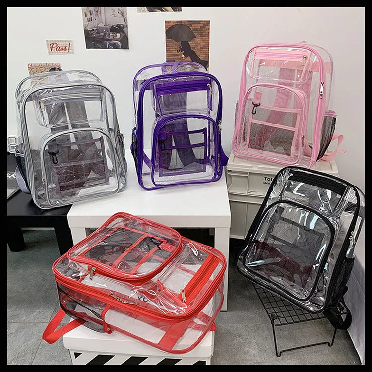 Transparent PVC waterproof backpack in grey with a visible black voile inner bag inside.