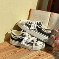 Women's low-top canvas shoes in beige, with rubber sole and flat heel