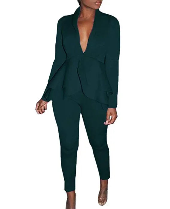 Business casual shirt and pencil pants set in polyester fabric on a hanger.