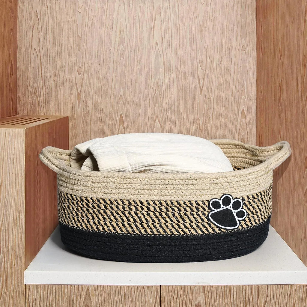 Light beige handmade cotton rope storage basket with wooden handles