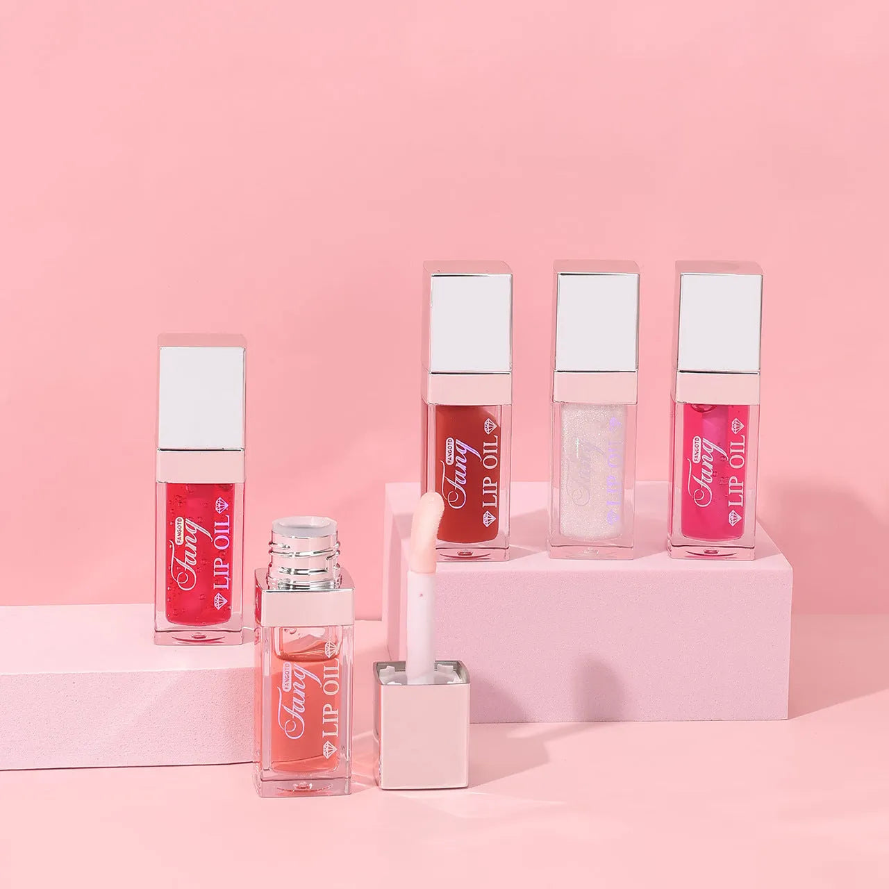 Five bright colour lip gloss lipstick tubes with moisturising essence oil including mint shade