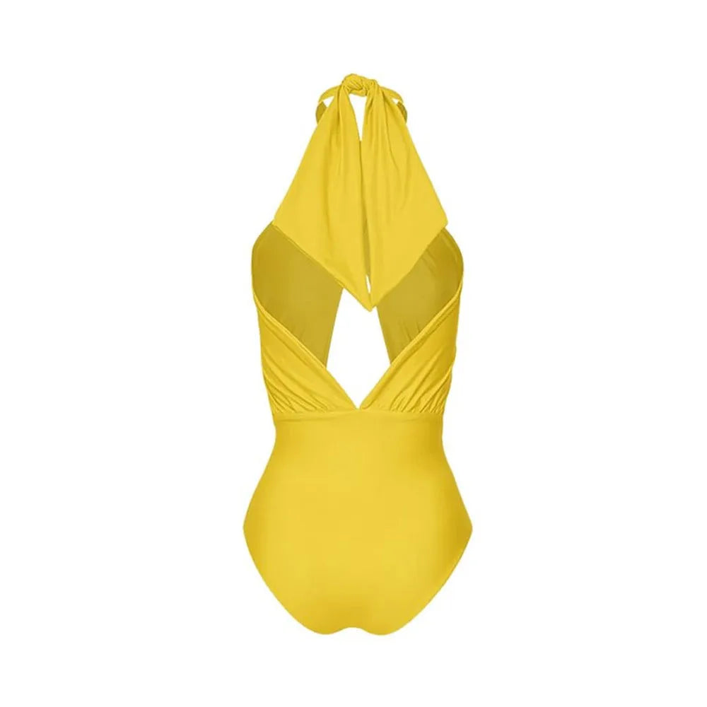 Women's halter neck one-piece swimsuit with coordinating wrap skirt in solid colour