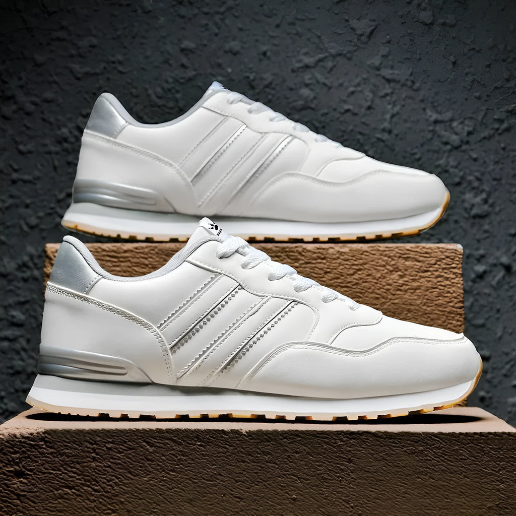Men's casual running sports shoes with carved wing pattern in black and white space leather