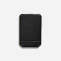 Black magnetic leather phone case with integrated stand, showing side profile and colour options.
