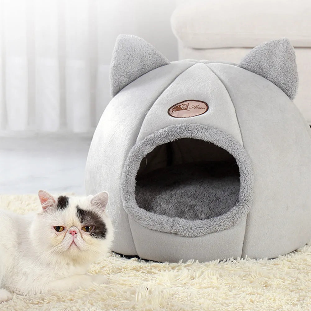 Large enclosed winter cat sofa bed with plush lining for indoor pet warmth
