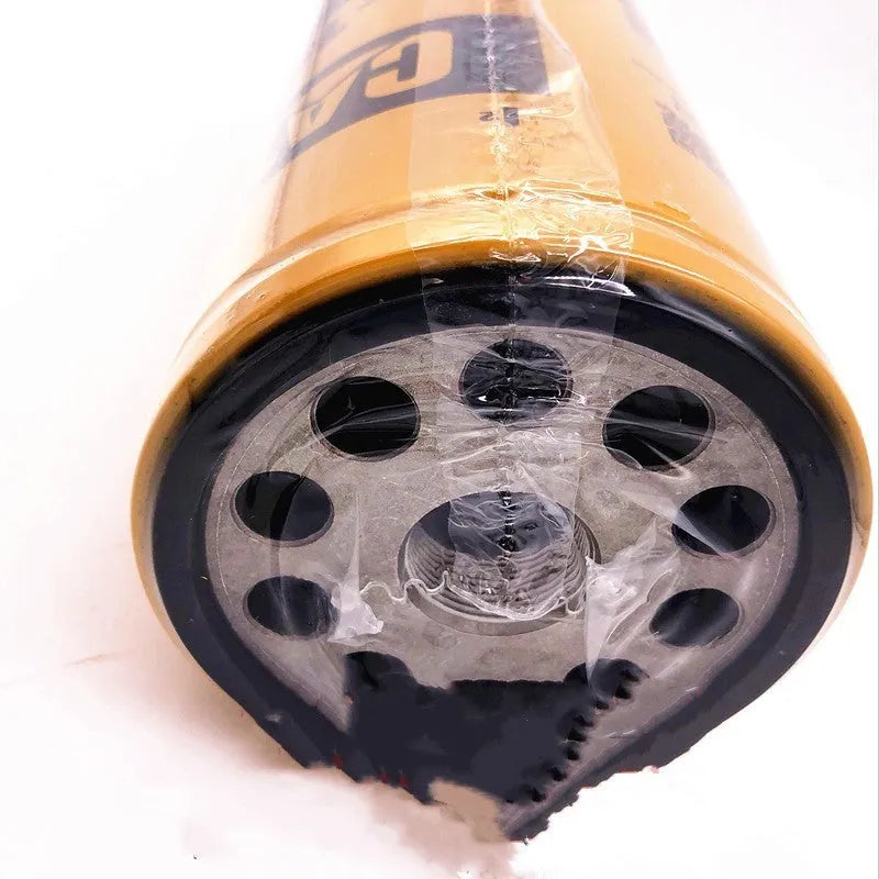 Yellow Caterpillar engine fuel water separator filter element, 262mm tall.