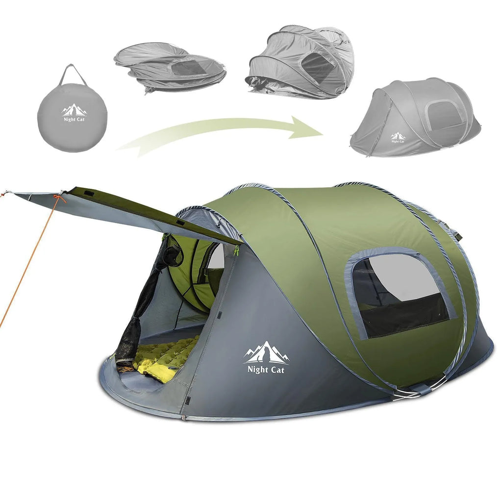 Dark green instant pop-up camping tent pitched outdoors, showing its automatic frame structure and two-person size.