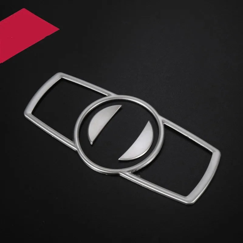 Silver ABS plastic interior sticker for BMW headlight switch frame on 5 Series, 7 Series, X3, and X4 models