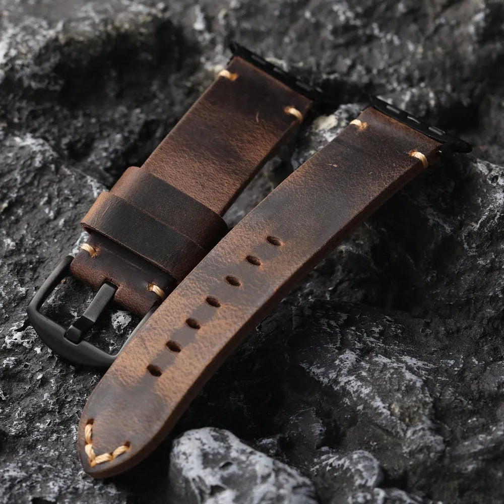 Brown handmade top layer cowhide watch strap with stainless steel buckle on a watch