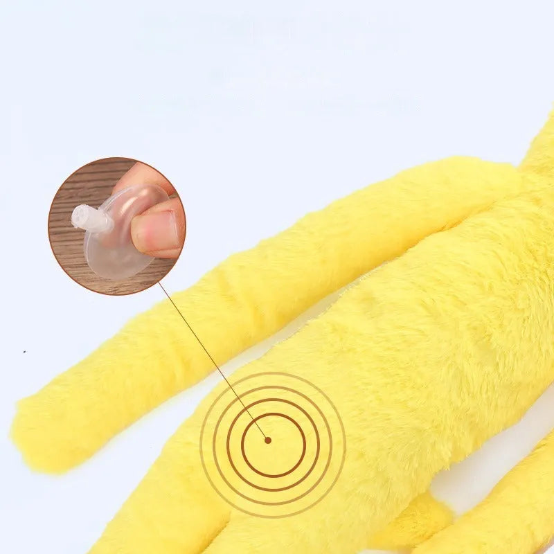 Pink and yellow golden retriever plush dog toy with squeaker and rattle.