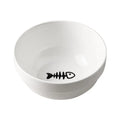 White ceramic cat bowl with cat footprints design on a black iron stand with cat-ear decoration.