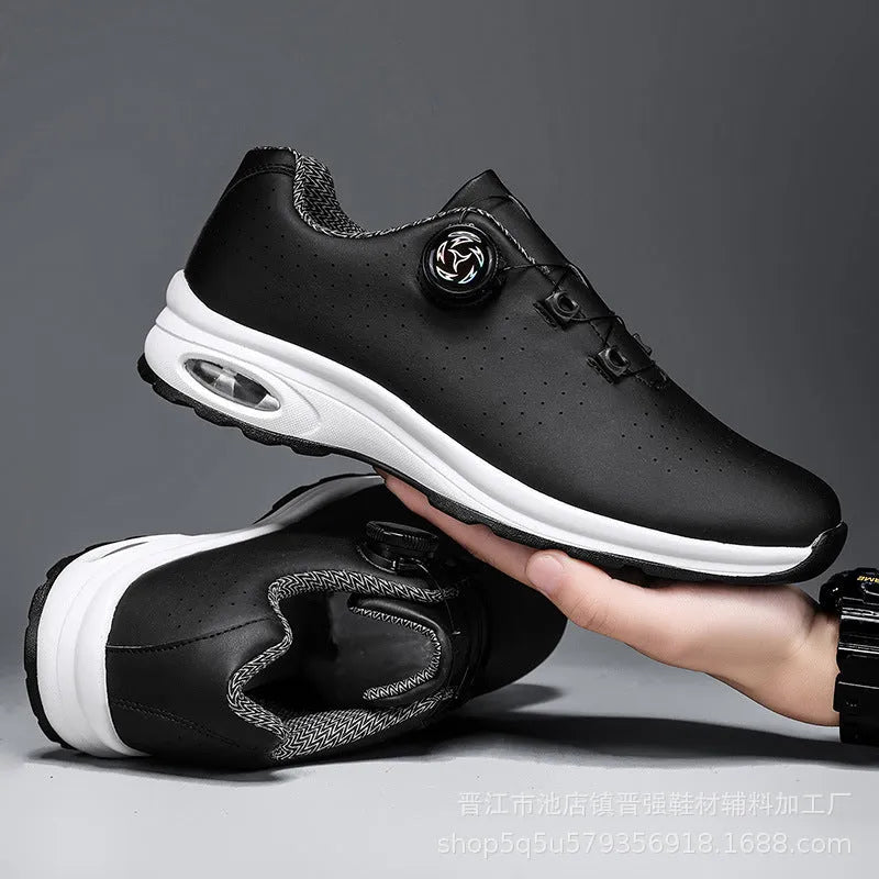 Black and white low-top mesh casual tennis shoes with cross shoulder straps and flat soles.