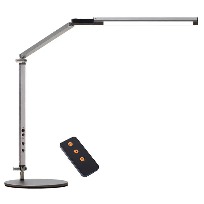 Black clip mount LED desk lamp with dimmer switch attached to study desk edge