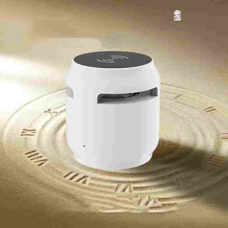 Wood grain wireless Bluetooth speaker with built-in wireless charger on a desk, 80x75x75mm plastic cabinet