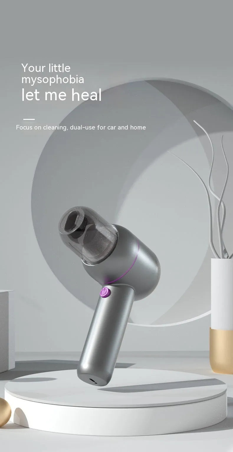 Grey handheld cordless car vacuum cleaner and inflator with brush nozzle and extended nozzle.
