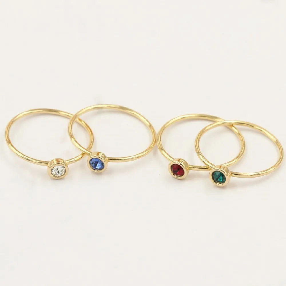 14K gilded GF zircon knuckle rings in green, blue, dark red, and white colours