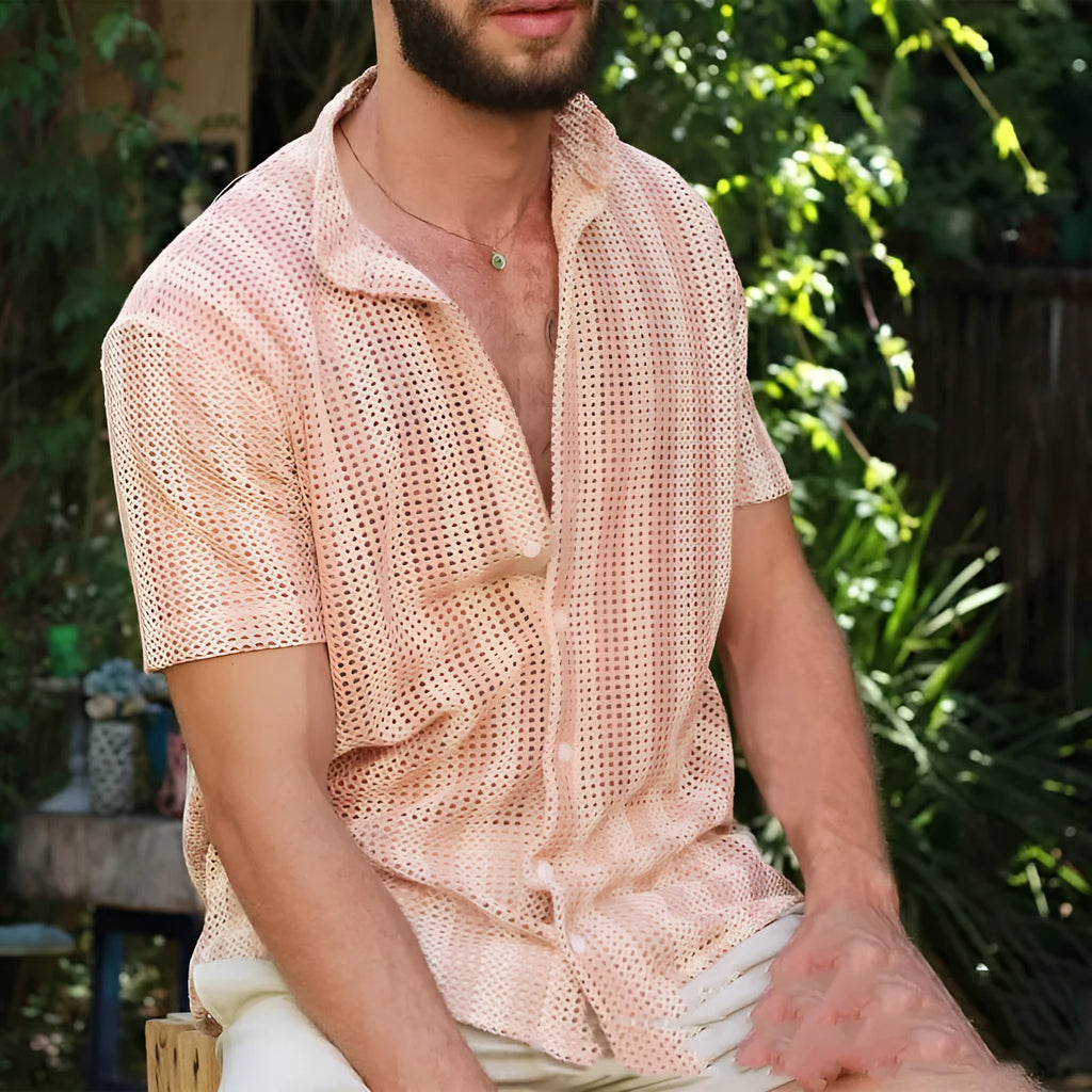 Pink waffle knit men's cardigan shirt with short sleeves laid flat
