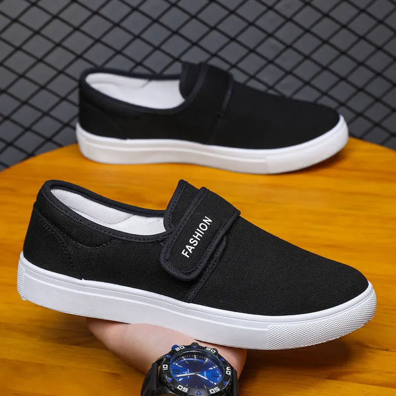 Men's canvas Velcro flat shoes in black low-top style with PVC sole