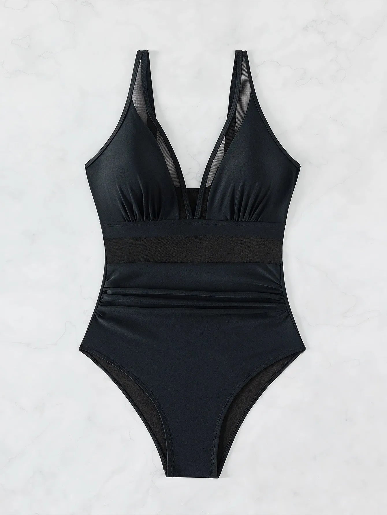 Black women's one-piece swimsuit with halter neck and briefs-style bottom made of nylon.