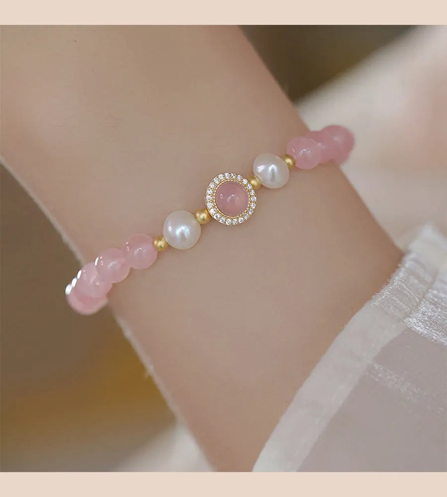 Women's copper bracelet with pink crystal pearls and golden balls, natural style jewellery.