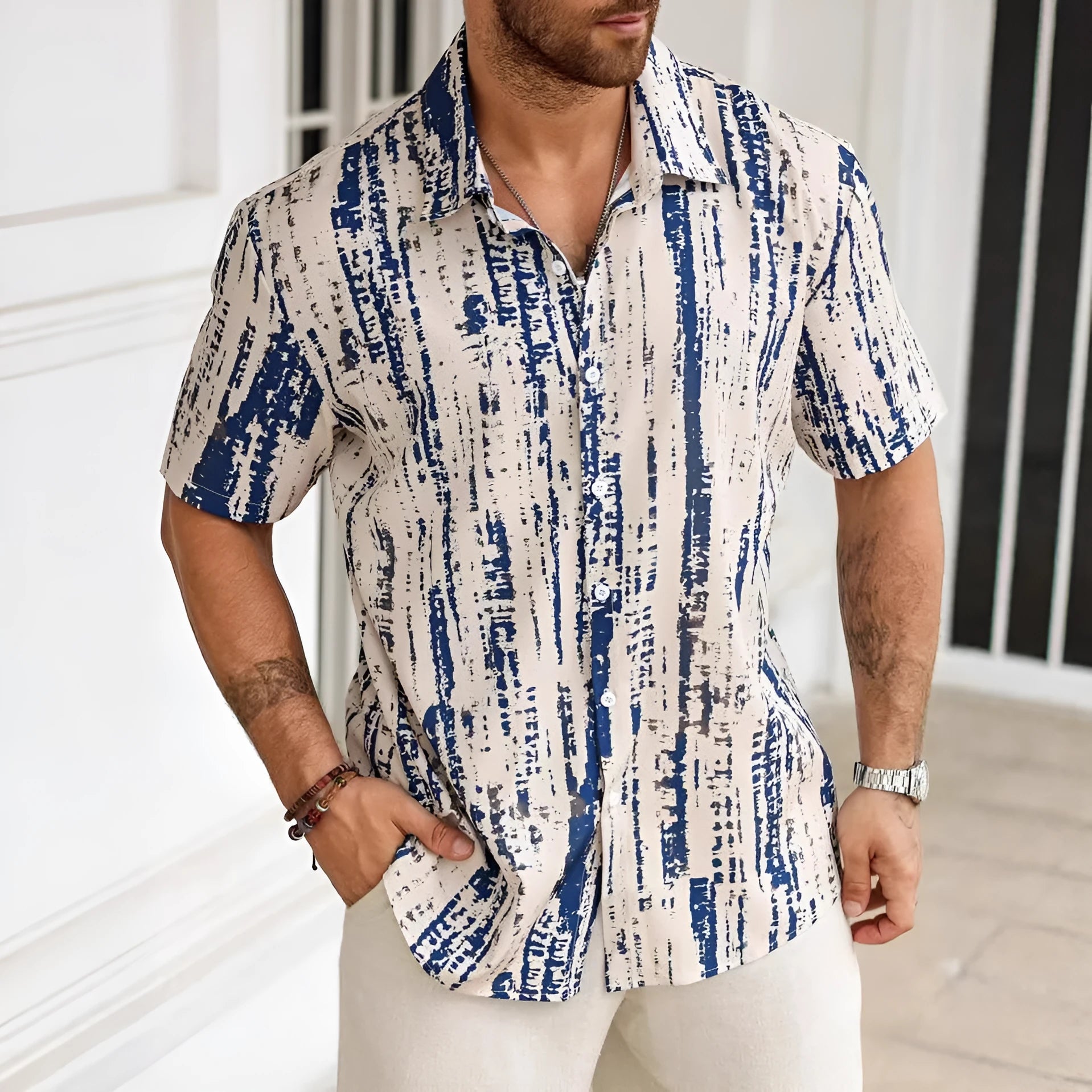 Men's blue and white striped short sleeve casual summer shirt on a hanger.
