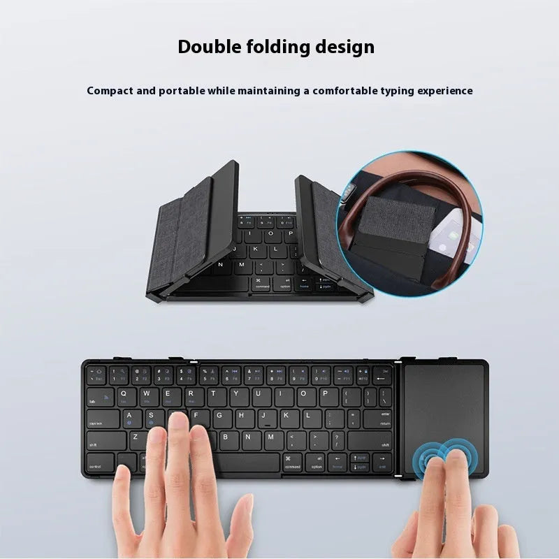 Black folding Bluetooth keyboard unfolded showing keys and touchpad option