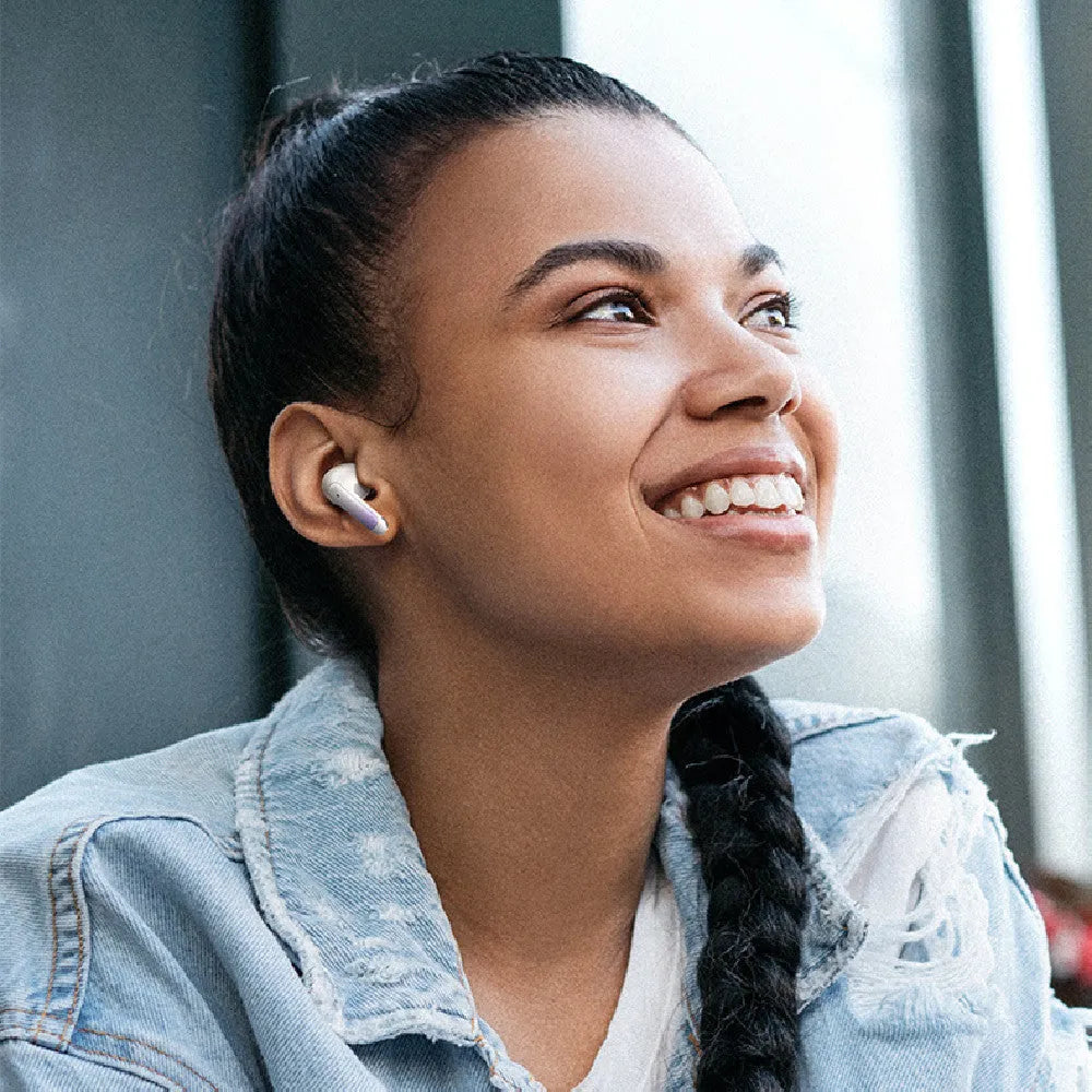 Wireless sports gaming Bluetooth headset in gradient colours showing compact design with in-ear fit