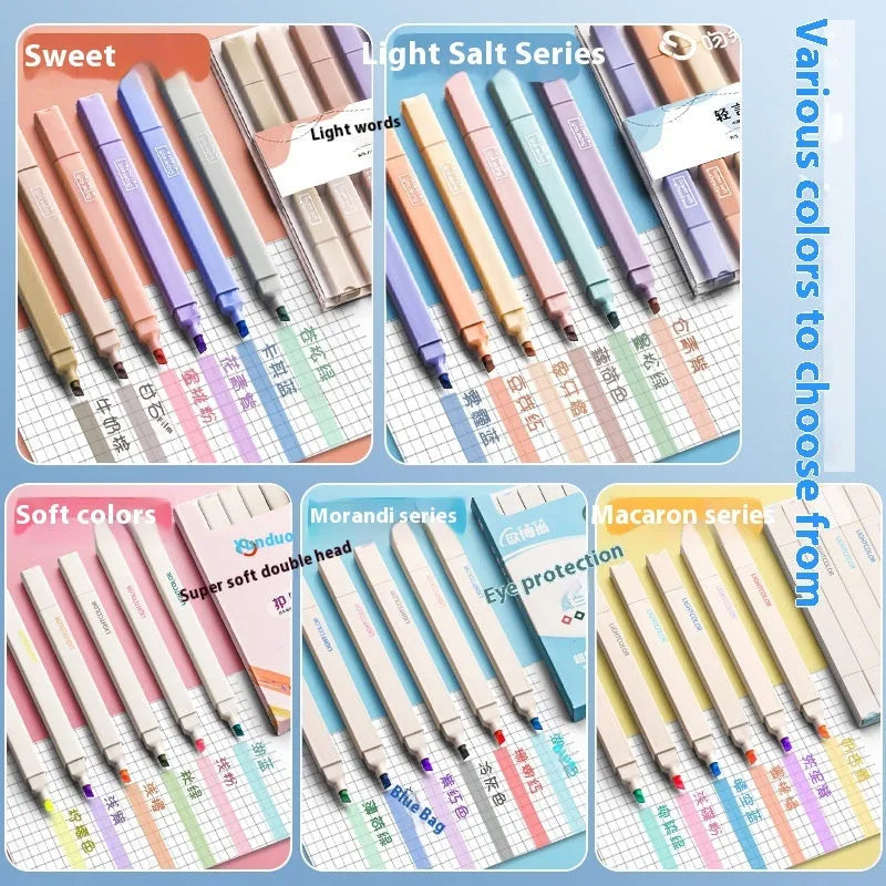 Set of double-tipped fluorescent marking pens in mixed colours on a white background.